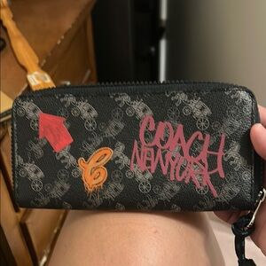 Coach New York Black Wallet with Red and Orange Accents